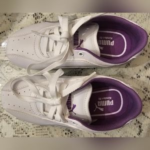 Brand new Puma toddler white and purple shimmery sneakers.   Size:  11.5 US.